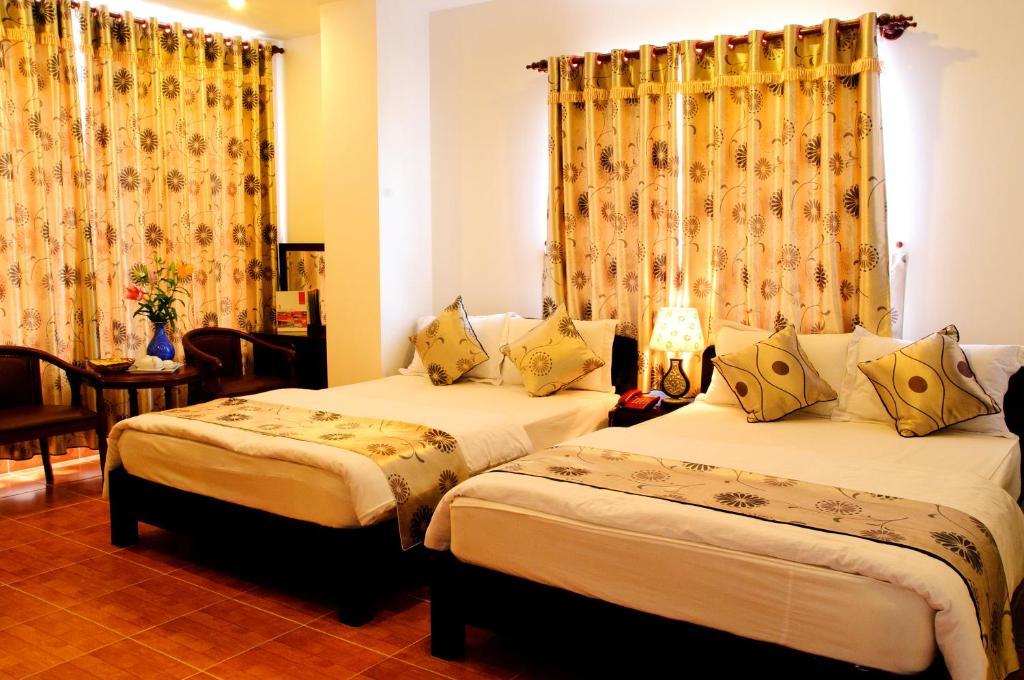 Minh Quan Hotel Bao Loc Ruang foto